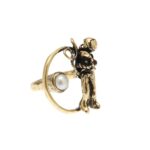 Anello originale a forma di astronauta con perla e granato