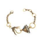 Bracciale creativo raffigurante un pesce con perle