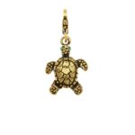 Bijoux fashion con tartaruga e smeraldo